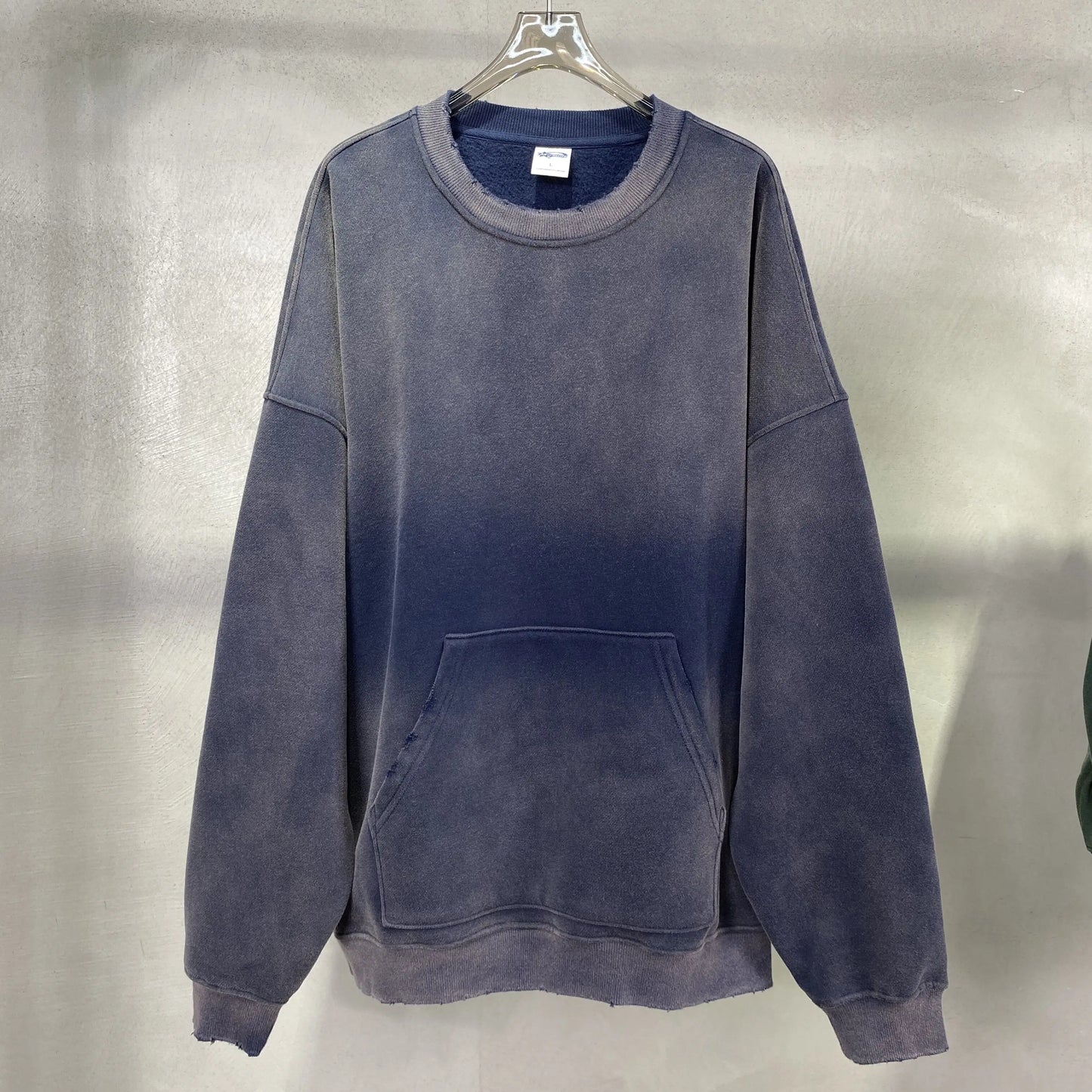 spray-dyed worn round neck sweater