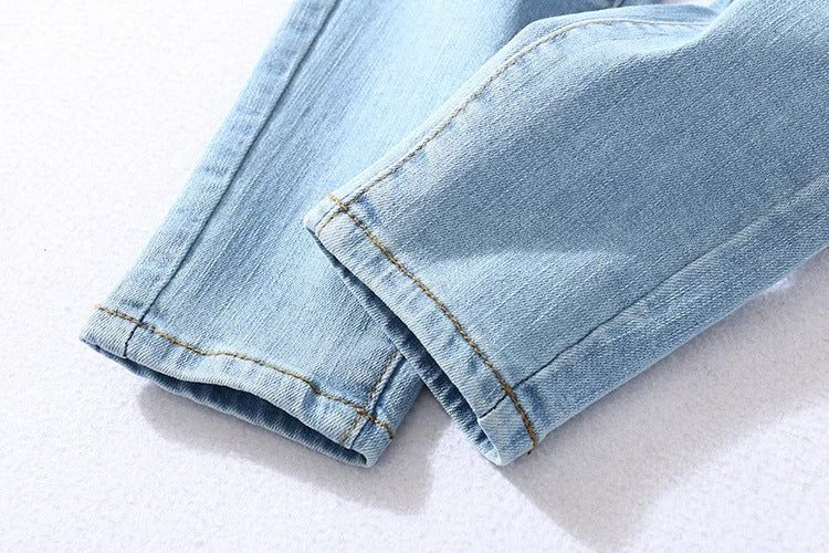 Four button high-rise jeans